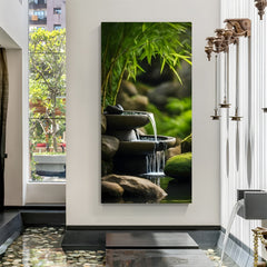 Japanese-style Zen bamboo garden with cascading water and lush green foliage in premium canvas wrapped frame