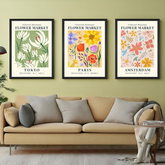 Canvas wall art set of 3 featuring “Flower Market” text with Tokyo, Paris, and Amsterdam city names and floral illustrations – perfect for chic interior decor