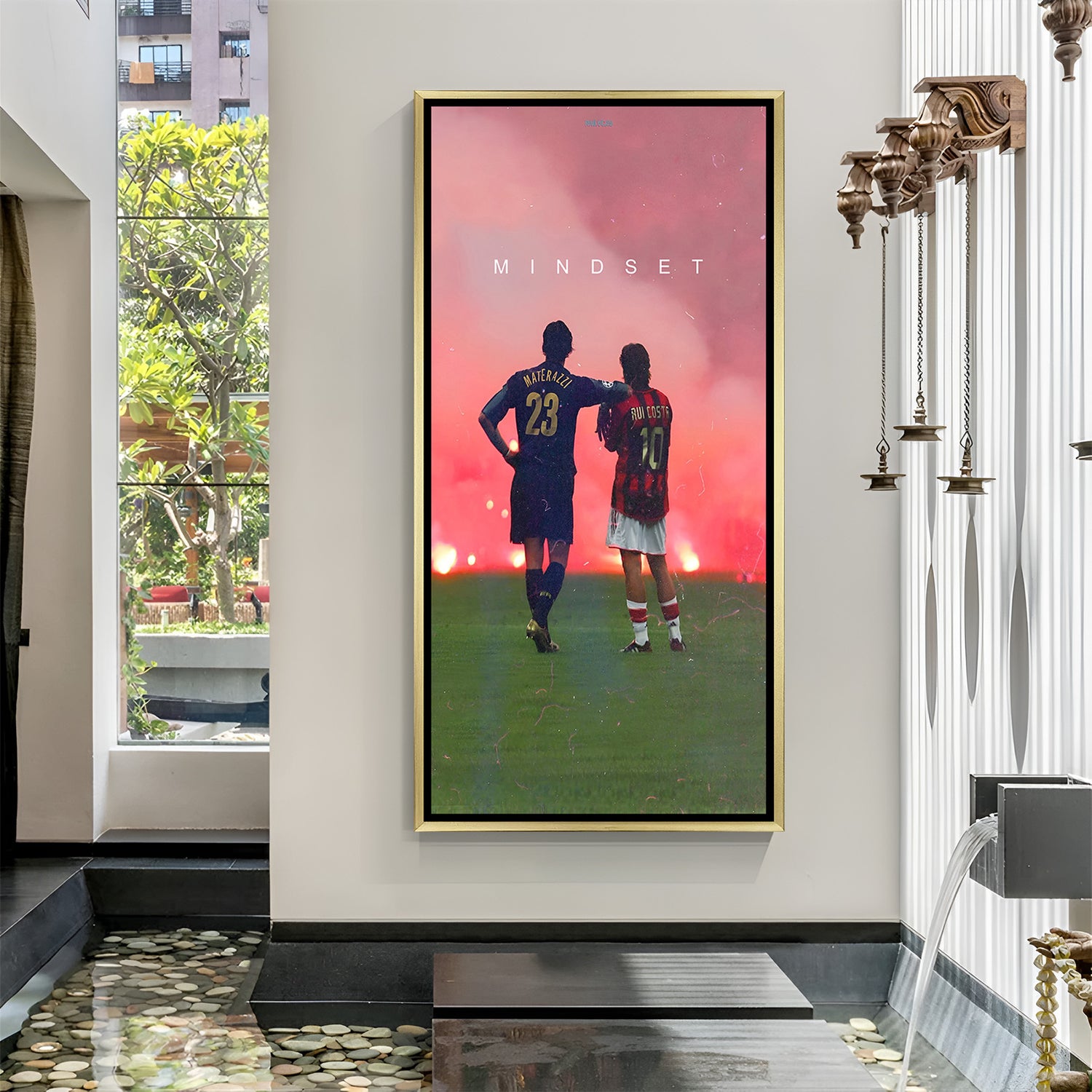 Golden framed canvas showing football legends watching a burning field with bold Mindset message