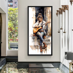 Abstract hand-painted canvas wall art of a girl sitting on stairs playing guitar in black floater frame