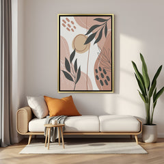 Golden framed artwork with leaf elements and light brown shapes in calming bohemian tones