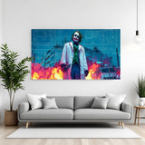 Joker standing canvas wall art with fiery background in wrapped frame cinematic dark villain style