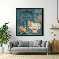 Kamdhenu cow canvas painting in black floater frame with spiritual art aesthetics, traditional pichwai style, and vastu-based Indian wall decor