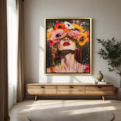 Hand-painted abstract canvas wall art of a lady face with flowers coming out of eyes, vibrant and surreal style, in golden floater frame, ideal for elegant wall decor