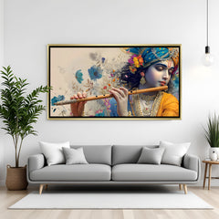 Elegant Lord Krishna wall art in gold frame with floral background.