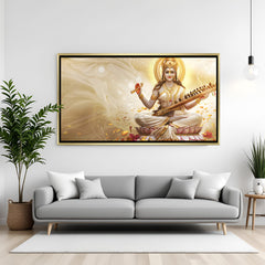 Elegant Saraswati lotus veena wall decor in premium golden floater frame.