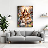 Maa Saraswati seated on white lotus with swan and pink lotus flowers in beautiful natural scenery canvas wall art