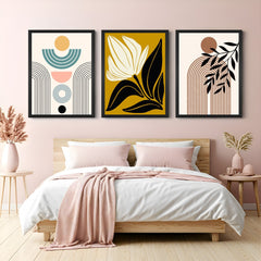 Bohemian canvas wall art trio with simple minimal forms, flower design, and abstract leaf linework in soft earthy tones – great for stylish interiors