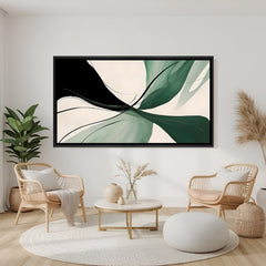 Modern green abstract canvas wall art with flowing shapes in black floater frame displayed in contemporary living room decor