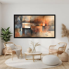 Earthy geometric abstract canvas wall art in rust, beige, and grey tones with black floater frame above sofa in modern living room decor