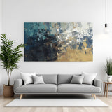 Modern abstract canvas wall art in blue, grey, and gold tones with geometric texture design displayed above sofa in contemporary living room canvas wrap decor