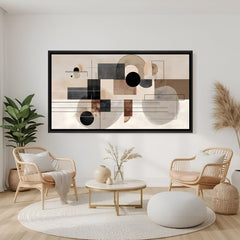 Neutral geometric abstract canvas wall art with black floater frame featuring circles and lines above sofa in contemporary living room decor