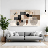 Modern geometric abstract canvas wall art in neutral beige and black tones with circles and lines displayed above sofa in minimalist living room canvas wrap decor