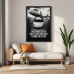Motivational canvas wall art with black floater frame featuring the quote “They want to fly first class, we want to own the plane”