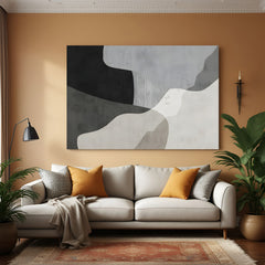 Neutral abstract canvas wall art with organic shapes in beige grey and black tones in modern living room