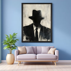 Black-framed modern art canvas showing a hitman-style man in painted form—perfect for statement decor in gaming setups, bachelor pads, or offices