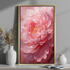 Golden-framed canvas painting of a pink flower in bloom, designed to bring warmth and floral charm to stylish interiors
