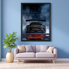 Black floater frame Porsche wall art featuring its rear design against a rich blue background—perfect for stylish car-themed rooms or offices