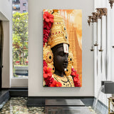 Close-up profile of Tirupati Balaji with golden crown and red flower garlands in premium canvas wrapped frame