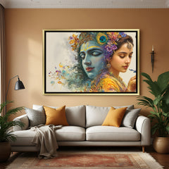 Elegant Radha Krishna wall art in gold frame with floral and peacock feather details.