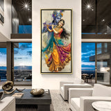 Elegant Radha Krishna dancing wall decor in gold frame for pooja or hallway.