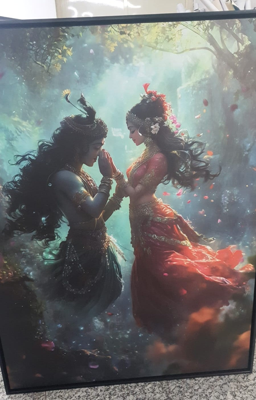 Premium real product image of Radha Krishna wall art with an elegant black floater frame. Showcasing divine detailing, vibrant colors, and a premium canvas finish. Perfect for bringing spiritual vibes, positivity, and Vastu harmony to living rooms, bedrooms, or meditation spaces.