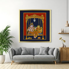 Golden frame Radha Krishna Tanjore canvas wall art with wooden swing for ethnic spiritual decor in living rooms or pooja corners