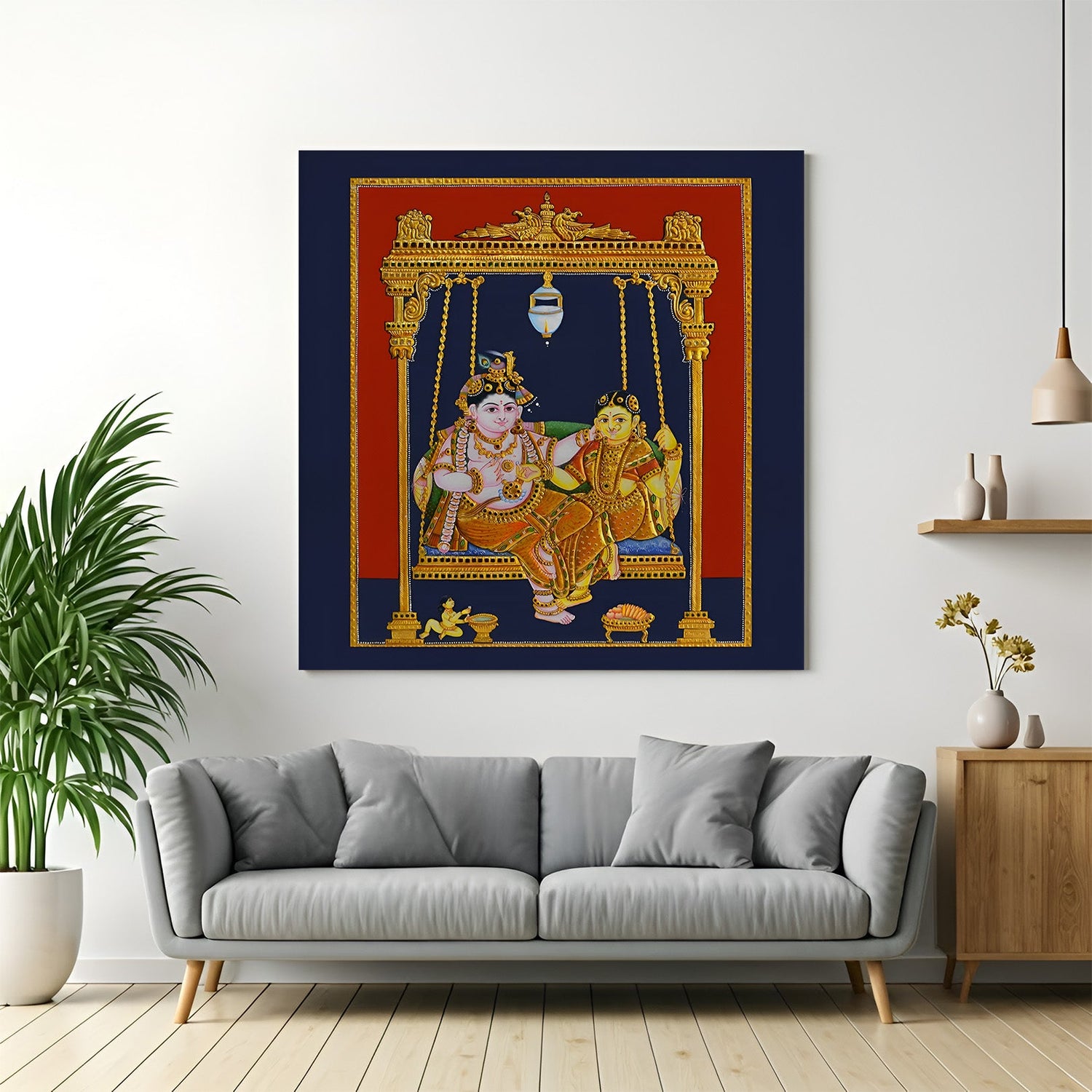 Radha Krishna Tanjore canvas painting showing divine couple on wooden swing in traditional South Indian art style for spiritual wall decor
