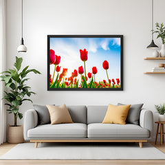 Framed canvas of a red tulip landscape with black floater frame, ideal for dramatic and colorful modern interiors