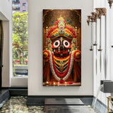 Canvas wrapped vertical Jagannath portrait wall art with red garlands, gold ornaments, and temple diya lights.