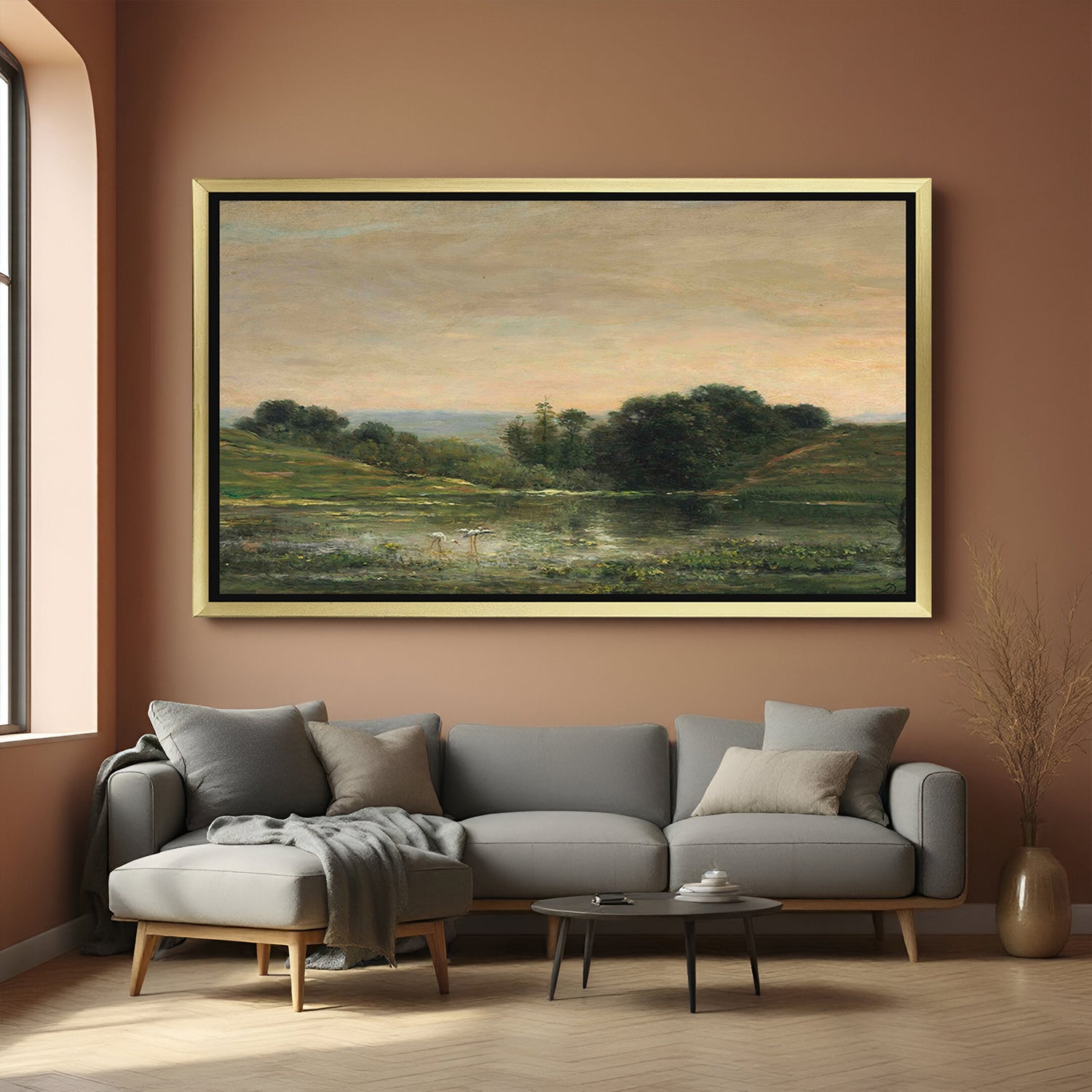 Golden-framed wall art of greenery and nature on ancient-looking canvas—rustic vintage landscape decor