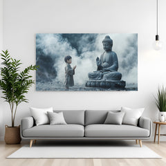 Panoramic Buddha and child wall art in canvas wrapped frame showing a young boy praying before a seated Buddha statue in mist.