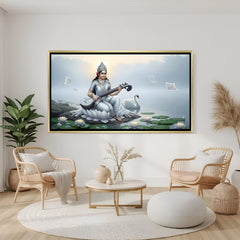 Serene Goddess Saraswati artwork in elegant golden floater frame displayed in modern home decor.