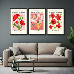 Set of 3 flower market prints with city names Mariupol, Vienna, and Kyoto – artistic floral canvas wall art ideal for modern and feminine interiors