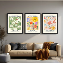 Floral-themed canvas trio featuring city names Tokyo, Paris, and Amsterdam under “Flower Market” title – elegant wall art for modern and feminine spaces