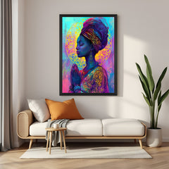 Framed canvas showing an African girl in prayer against a mystic, abstract backdrop, in black floater frame for elegant interiors