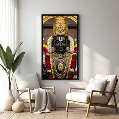 Majestic Tirupati Balaji artwork with golden jewelry and floral garlands in elegant black floater frame