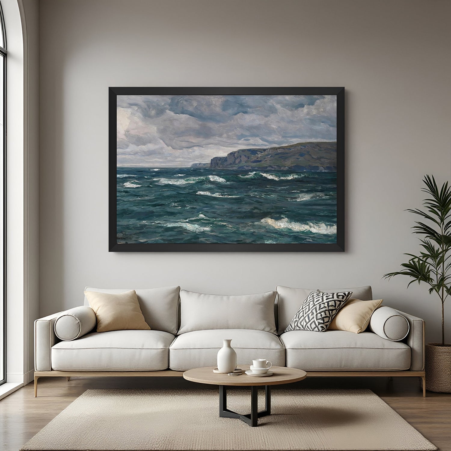 Black-framed vintage sea scene with cloudy skies and hills—timeless canvas print for elegant interiors