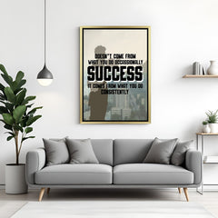 Motivational wall art with golden floater frame featuring success quote