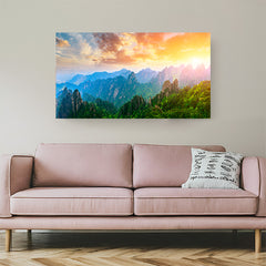 Canvas wall art of sunrise behind hills with soft rainbow-like light effect from sunlight curl, creating a peaceful and glowing natural scenery for decor