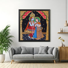 Radha Krishna Tanjore-style canvas painting in black floater frame for pooja room and ethnic home wall decor