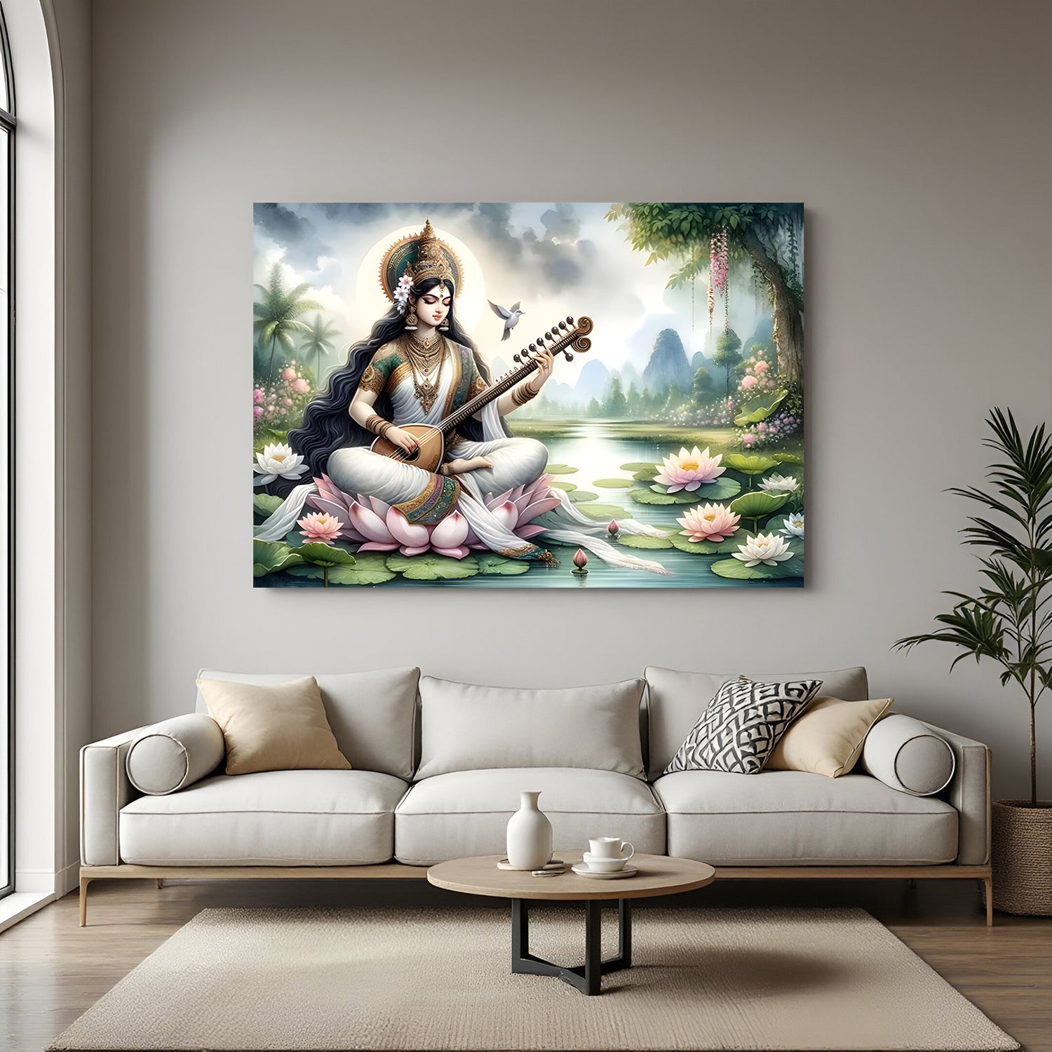 Saraswati seated on pink lotus in garden setting canvas wrapped wall art above sofa.
