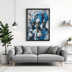 Framed canvas of African tribal group in minimalist blue and white tones, set in a black floater frame for modern Afrocentric spaces