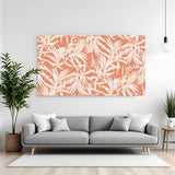 Tropical botanical canvas wall art with white leaf pattern on coral background displayed above sofa in modern living room canvas wrap decor