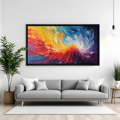 Colorful abstract canvas wall art with red, yellow, and blue tones in black floater frame above sofa in contemporary living room