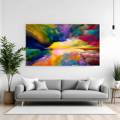 Vibrant abstract canvas wall art with colorful landscape reflection in blue, yellow, red, and green tones displayed above sofa in modern living room canvas wrap decor