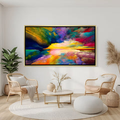 Vibrant abstract canvas wall art with multicolor reflection design in golden floater frame displayed in elegant modern living room decor