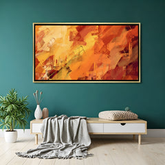 Vibrant abstract canvas wall art in warm orange and gold tones with golden floater frame displayed in elegant modern living room decor