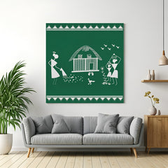Warli tribal art canvas painting in black floater frame highlighting authentic tribal wall decor
