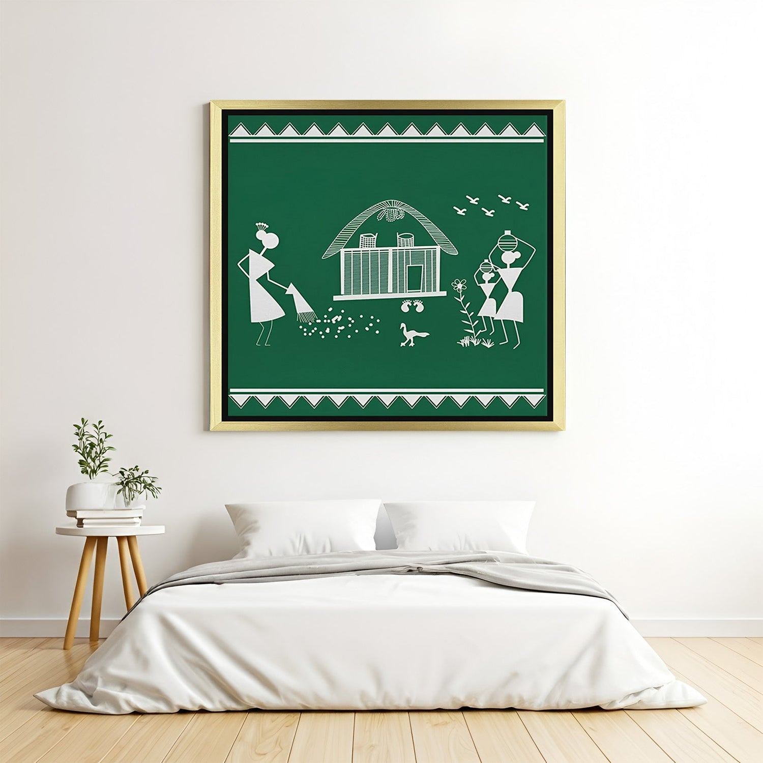 Warli tribal art canvas in golden floater frame adding ethnic charm to Indian folk interiors